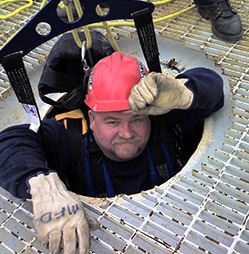 Firefighter in Man Hole